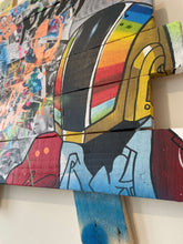 Carica l'immagine nel visualizzatore di Gallery, Close-up of POP Art collage featuring Daft Punk characters on palette wood, blending vibrant colors and textures.
