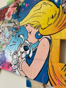 Colorful Pop Art canvas featuring a girl kissing a dog, blending vibrant acrylics and comic elements.