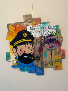 Tableau POP Art représentant le capitaine Haddock sur planches de palette colorées.