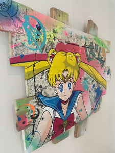 Pop art Sailor Moon tableau on wood palette, vibrant colors and detailed design, perfect for anime enthusiasts.
