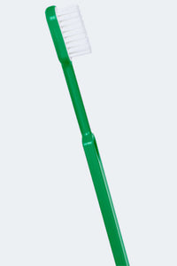 Brosse à dents Caliquo verte avec tête rechargeable en bioplastique, fabriquée en France, écologique et durable.